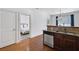 Kitchen sink with a bedroom view showing a stainless steel dishwasher and granite countertop at 879 Perennial Dr, Sandy Springs, GA 30328