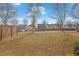 A view of the backyard and fence showcasing the home's outdoor space and privacy at 2725 Morgan Glen Rd, Buford, GA 30519