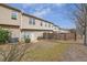 Backyard view showcasing a well-maintained lawn and exterior of the home at 2725 Morgan Glen Rd, Buford, GA 30519