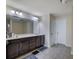 Bathroom featuring double sink vanity and ample cabinet space at 2725 Morgan Glen Rd, Buford, GA 30519