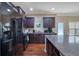 Well-appointed kitchen showcasing stainless steel appliances and plenty of cabinet space at 2725 Morgan Glen Rd, Buford, GA 30519