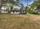 Exterior of a charming home featuring a deck and spacious backyard at 2704 Ellen Way, Decatur, GA 30032