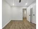 A clean, empty bedroom with light hardwood floors and fresh paint at 2704 Ellen Way, Decatur, GA 30032