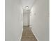 A hallway with fresh paint, modern lighting, and wood look floors at 2704 Ellen Way, Decatur, GA 30032