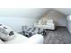 Charming bonus room with plush carpeting, comfortable seating, and modern ottoman at 40 Eryn Ter, Covington, GA 30014