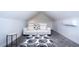 Cozy bonus room with neutral walls, plush carpeting, and comfortable seating creates a perfect retreat at 40 Eryn Ter, Covington, GA 30014