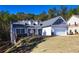 Newly built home with gray siding and stone accents at 40 Eryn Ter, Covington, GA 30014