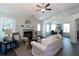Open living room showcasing a fireplace and adjacent dining area at 40 Eryn Ter, Covington, GA 30014