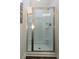 Bathroom shower features glass doors, tile, and chrome fixtures at 40 Eryn Ter, Covington, GA 30014
