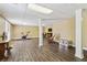 Spacious basement featuring wood floors, drop ceilings, and ample lighting at 1150 Cedar Bluff Sw Trl, Lilburn, GA 30047