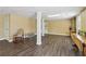 Spacious basement featuring wood floors, drop ceilings, and ample lighting at 1150 Cedar Bluff Sw Trl, Lilburn, GA 30047