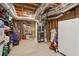 Unfinished basement with storage shelves and mechanical components at 1150 Cedar Bluff Sw Trl, Lilburn, GA 30047