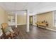 Spacious basement featuring wood floors, drop ceilings, and ample lighting at 1150 Cedar Bluff Sw Trl, Lilburn, GA 30047