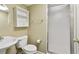 Well-lit bathroom features a modern shower and vanity with built-in storage at 1150 Cedar Bluff Sw Trl, Lilburn, GA 30047
