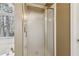 Bathroom shower boasting sliding doors at 1150 Cedar Bluff Sw Trl, Lilburn, GA 30047