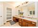 Double vanity bathroom with large mirror and ample storage at 260 Koller Dr, Powder Springs, GA 30127