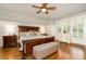 Spacious Primary bedroom with hardwood floors and large windows at 260 Koller Dr, Powder Springs, GA 30127