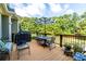 Spacious deck with seating, grill, and scenic wooded views at 260 Koller Dr, Powder Springs, GA 30127