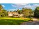 Stunning two-story home with expansive lawn and inviting front porch at 260 Koller Dr, Powder Springs, GA 30127