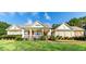 House with a large front porch and manicured lawn at 260 Koller Dr, Powder Springs, GA 30127