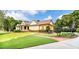 Home with a brick walkway and manicured lawn at 260 Koller Dr, Powder Springs, GA 30127