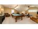 Fun game room featuring a pool table, comfortable seating, and a ceiling fan at 260 Koller Dr, Powder Springs, GA 30127