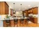 Gourmet kitchen with granite countertops, stainless steel appliances, and custom cabinetry at 260 Koller Dr, Powder Springs, GA 30127