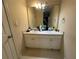 Double vanity bathroom with large mirror and plenty of counter space at 284 Valley Way, Hampton, GA 30228