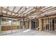 Unfinished basement area with exposed framing and concrete floors at 3384 Hidden Acres Dr, Atlanta, GA 30340