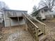 Backyard with a two-story deck and wood stairs at 1790 Spring Ave, East Point, GA 30344