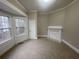 Spacious bedroom with bay window and neutral walls at 1790 Spring Ave, East Point, GA 30344