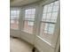 Bedroom with bay window and neutral colored carpet at 1790 Spring Ave, East Point, GA 30344