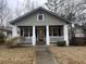 Charming craftsman home with front porch and landscaped yard at 1790 Spring Ave, East Point, GA 30344
