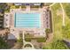 Birds eye view of a large pool with deck chairs and tables for residents to relax at 6615 Hampton Rock Ln, Cumming, GA 30041