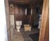 Functional basement bathroom with toilet, sink, and basic plumbing fixtures at 8587 Cumming Hwy, Canton, GA 30115
