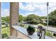 Scenic balcony with greenery and outdoor decor overlooking the neighborhood at 220 Renaissance Pkwy # 1203, Atlanta, GA 30308