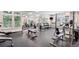 Well-equipped fitness center with various machines, weights, and ample workout space at 220 Renaissance Pkwy # 1203, Atlanta, GA 30308