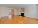 Bright living room featuring hardwood floors and a fireplace at 14 Newport Nw Pl, Atlanta, GA 30318