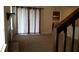 Living room with carpet, fireplace, and view into kitchen area at 1969 Corners Cir, Lithonia, GA 30058