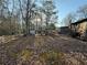 Large backyard with shed and various outdoor items at 224 Hollis St, Rutledge, GA 30663