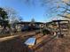Backyard with patio and partially covered deck at 224 Hollis St, Rutledge, GA 30663