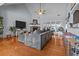 Spacious living room with vaulted ceilings, hardwood floors, and fireplace at 5515 Hancock Ln, Cumming, GA 30041
