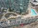 Aerial view of a community with pool and landscaped areas at 1080 Peachtree St # 2406, Atlanta, GA 30309