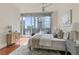 Main bedroom with hardwood floors and city view at 1080 Peachtree St # 2406, Atlanta, GA 30309