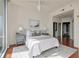 Main bedroom with hardwood floors and access to balcony at 1080 Peachtree St # 2406, Atlanta, GA 30309