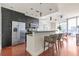 Modern kitchen with stainless steel appliances and island at 1080 Peachtree St # 2406, Atlanta, GA 30309