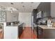 Modern kitchen with stainless steel appliances and granite counters at 1080 Peachtree St # 2406, Atlanta, GA 30309