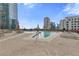 Resort-style rooftop pool with lounge chairs at 1080 Peachtree St # 2406, Atlanta, GA 30309