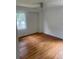 Bedroom with hardwood floors, ceiling fan and a window at 2351 Johnson Ferry Ne Rd, Chamblee, GA 30341