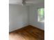 Simple bedroom with hardwood floors and window at 2351 Johnson Ferry Ne Rd, Chamblee, GA 30341